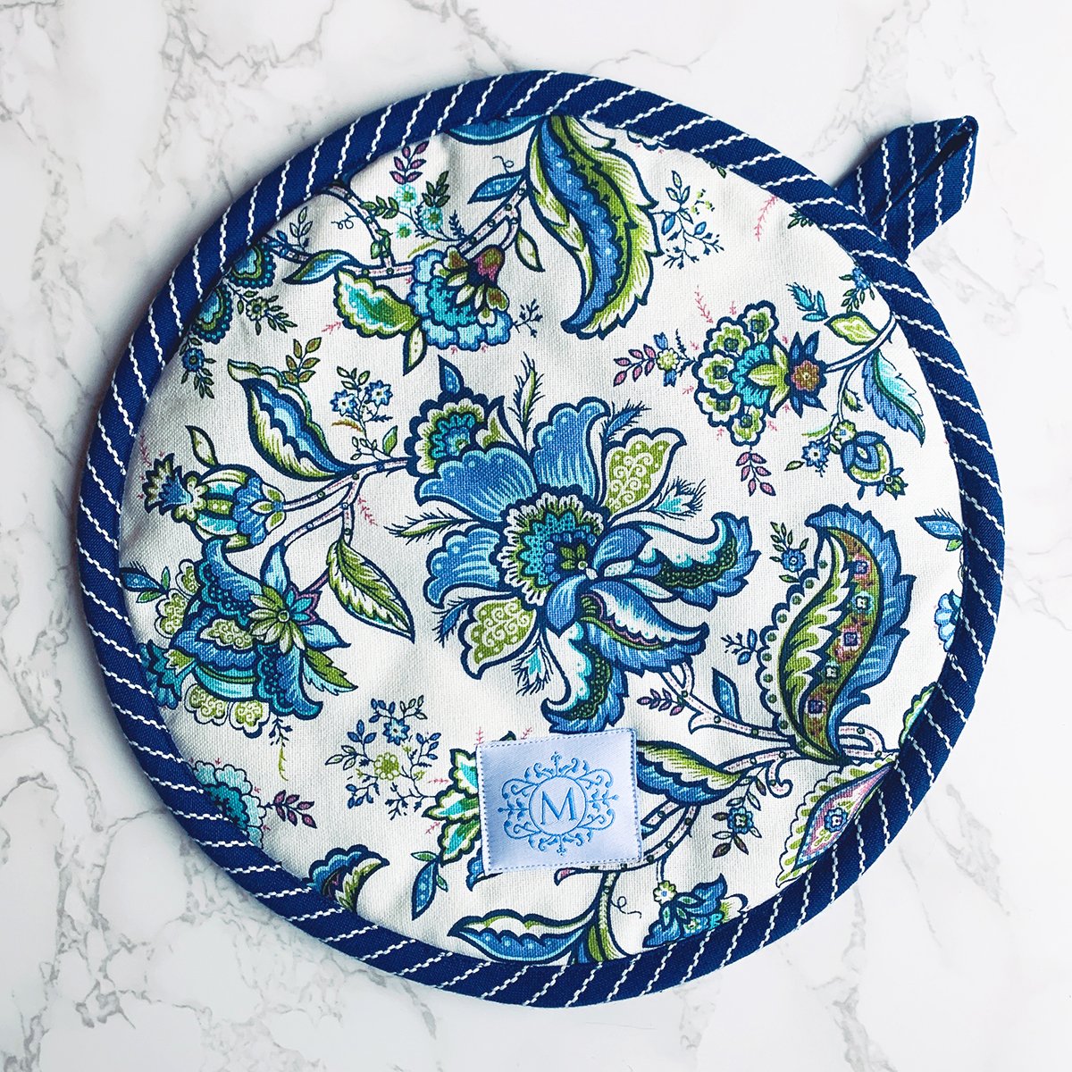 Oven Mitts & Pot Holder set | view of Mary's signature pattern side