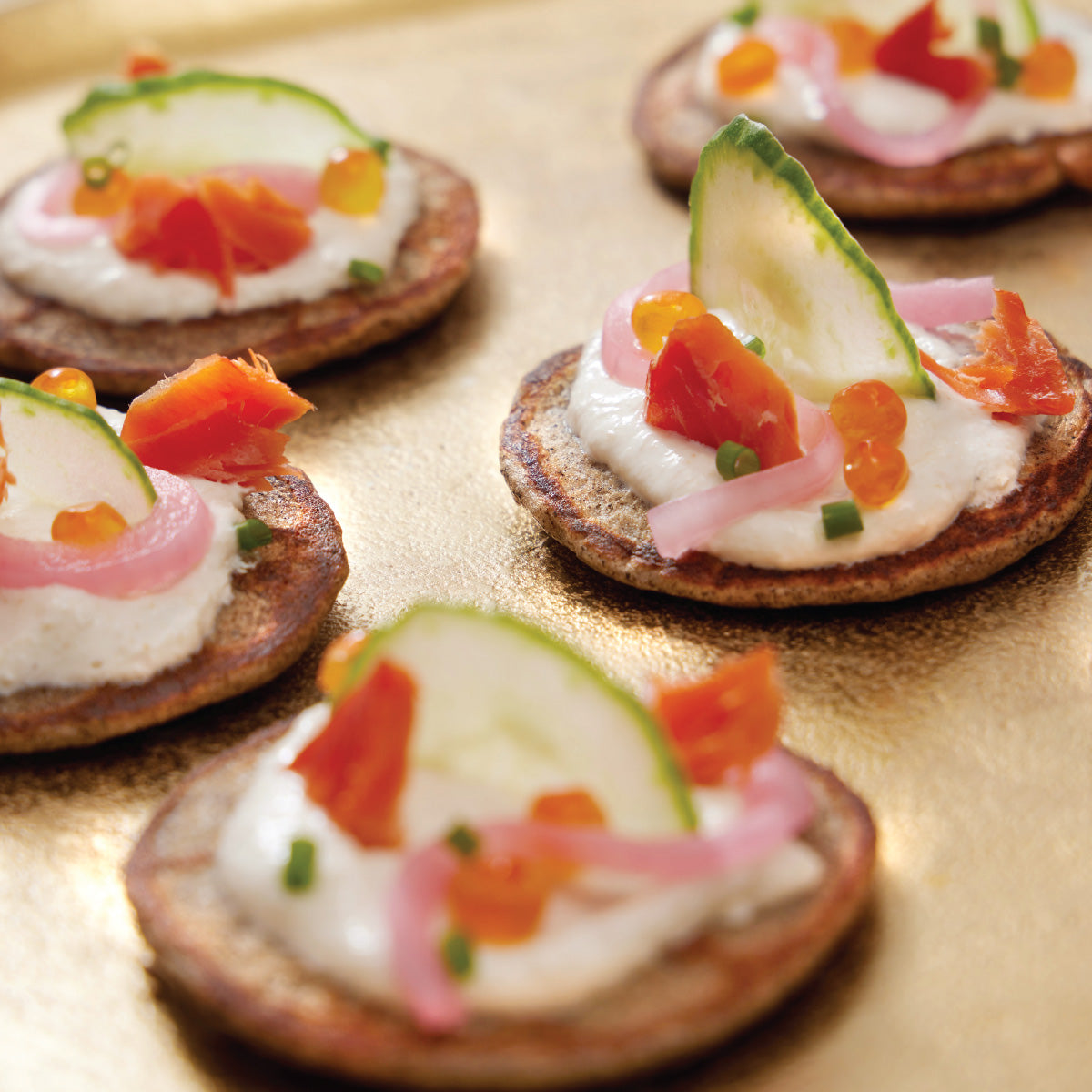 Blini Recipe with Smoked Trout and Pickled Onion