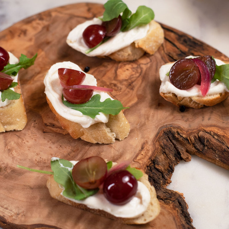 Goat Cheese Crostini with Pickled Grapes