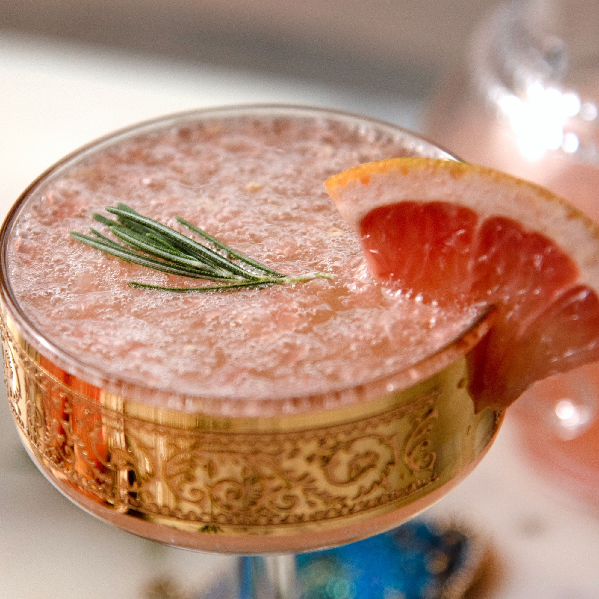 A light and delicious departure from the classic orange juice version, my Fresh Ruby Red Grapefruit and Rosemary Mimosa Recipe is sure to please your brunch guests. Did I mention that I love rosemary in cocktails? Click through and find out why!